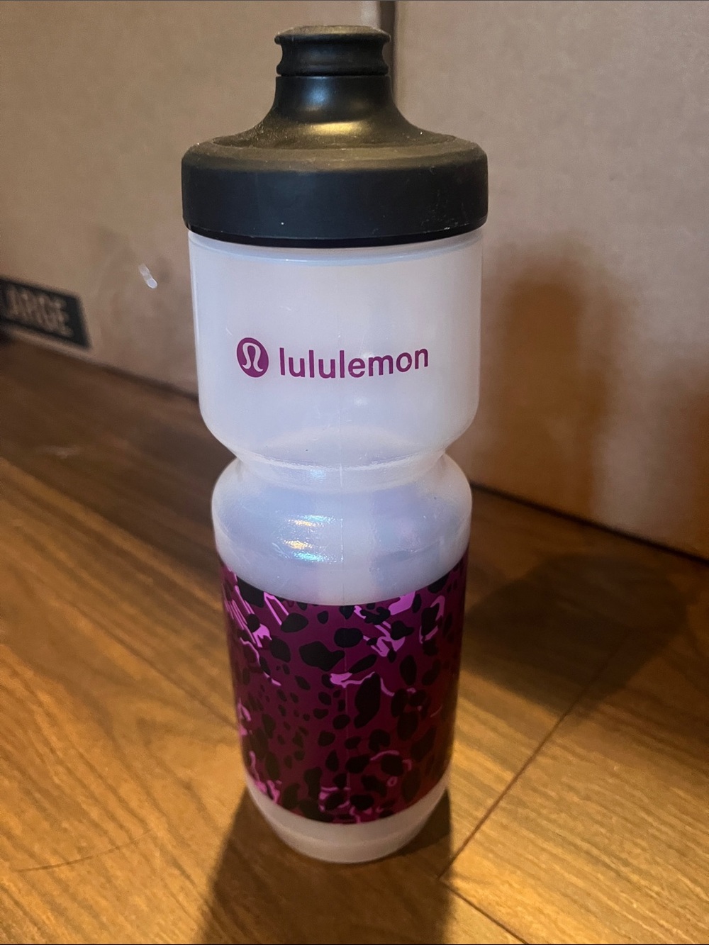 lululemon purple leopard print sports water bottle with black cap